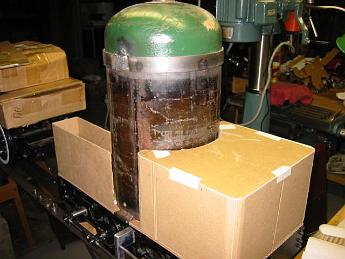  27-Oct-2002.  Alternative layout for the water tank.  The plans call for a square, windowed box to simulate a modern cab, which doesn't look right to me at all.  Here I've fashioned a rounded tank that hugs the boiler.  I think it would look really 